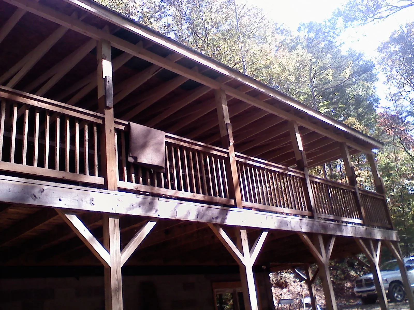 Timber framing under a new elevated porch and deck — Roof Leak Repair in Gateway by Roofing Brothers